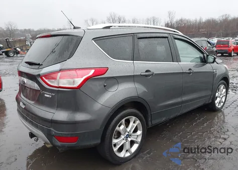 2016 Ford Escape Titanium from USA, damaged, VIN 1FMCU9J9XGUA48817